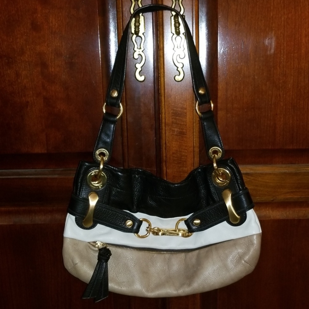 B. Makowsky color block purse